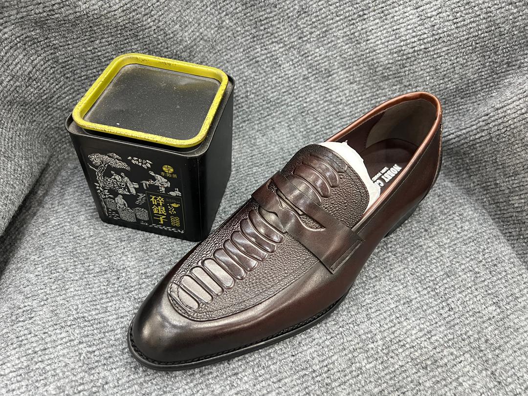 Brown leather penny loafers