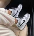 Nike Air Jordan 1 Mid "Light Smoke Grey" sneakers