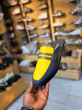 A two-tone leather slip-on mule