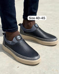 Black perforated leather slip-on sneakers
