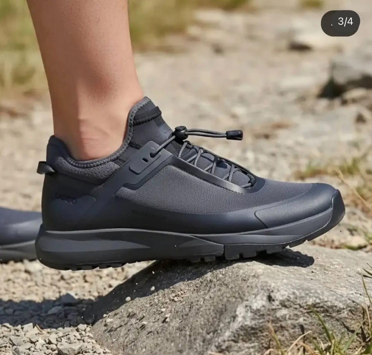low-top, black waterproof outdoor hiking sneaker